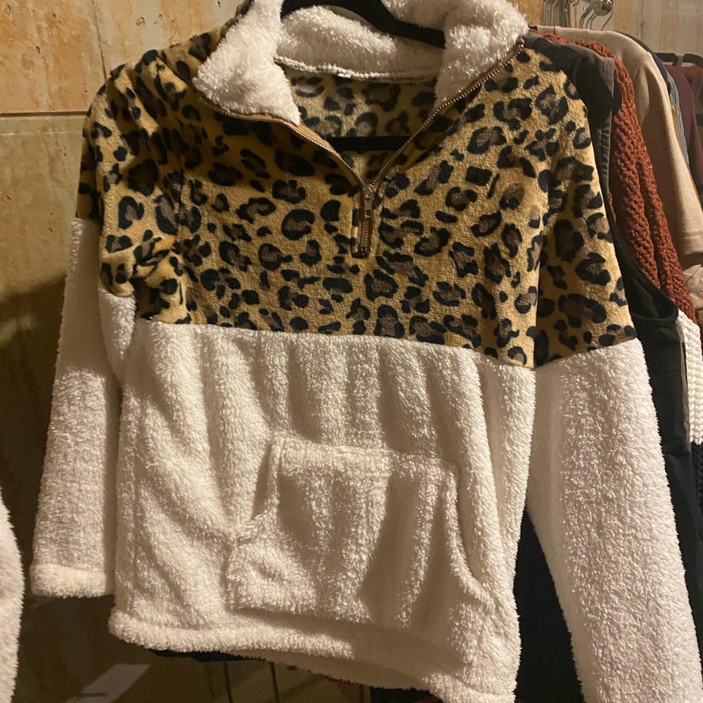 Size small 1/2 white 1/2 cheetah print quarter zip
